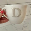 Kopp med bokstav 10 Beige kopp bokstav D